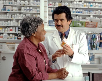 Elderly woman getting prescription
