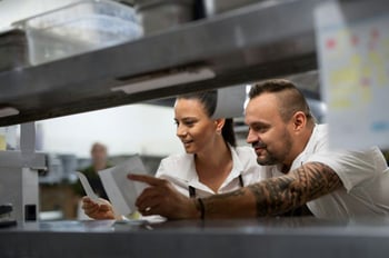 Restaurant team working together during a busy shift