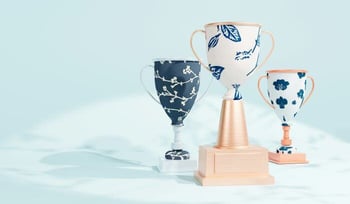 Similar vases with one on a pedestal