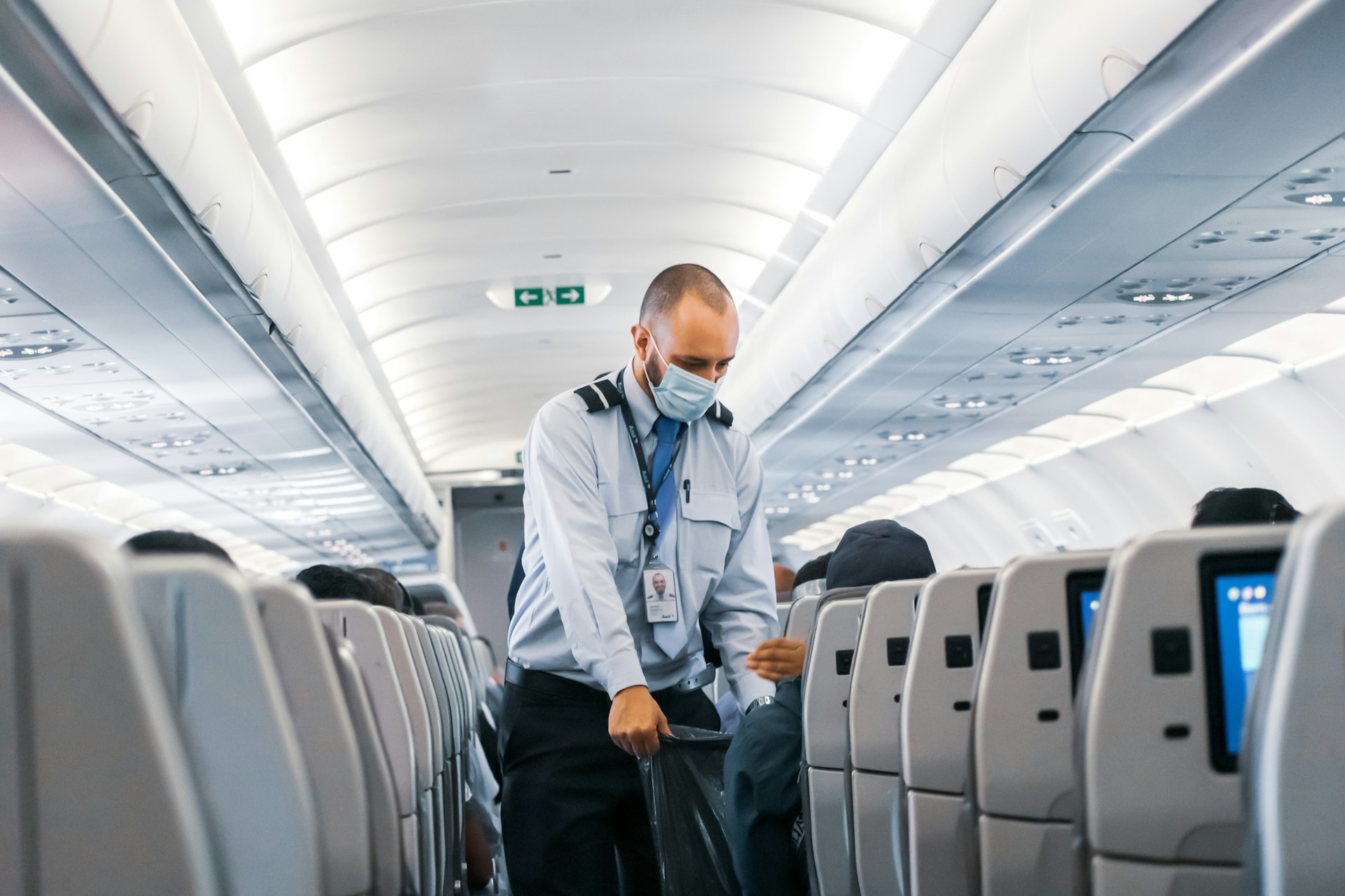 Flight attendant on airplane