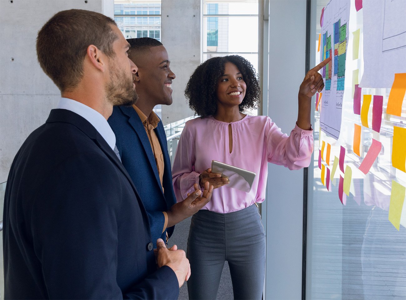 business people at note board cropped