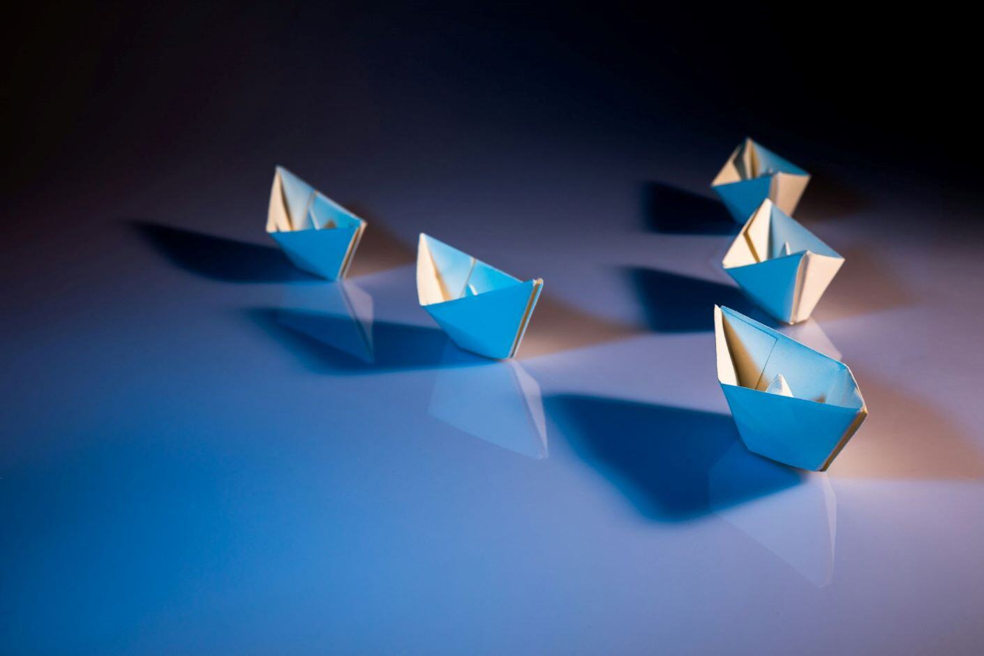 Leader paper boats