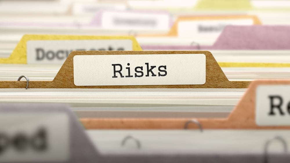 Risks Concept. Colored Document Folders Sorted for Catalog. Closeup View. Selective Focus.