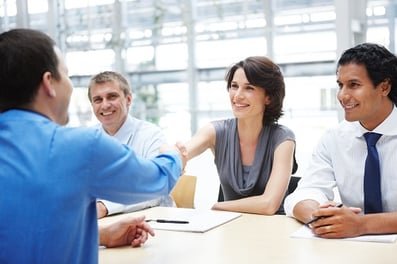 Two-men-and-a-woman-interviewing