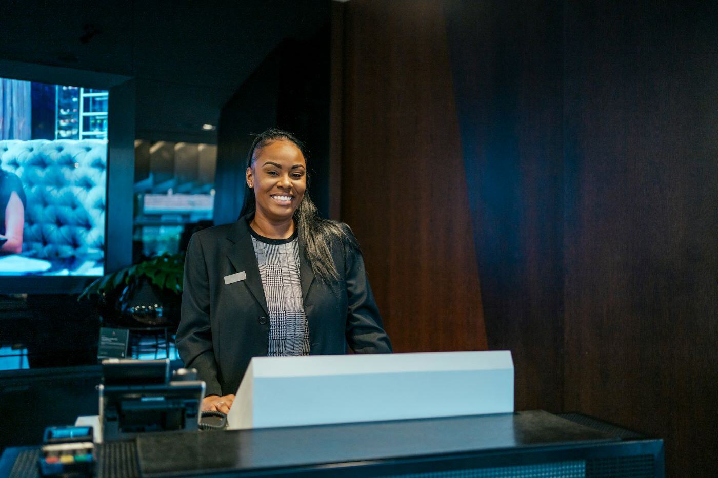 Woman at hotel front desk