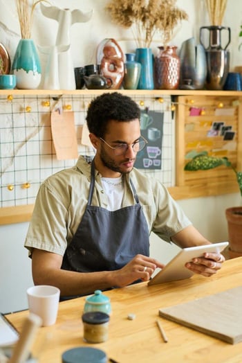 Young man looking at tablet