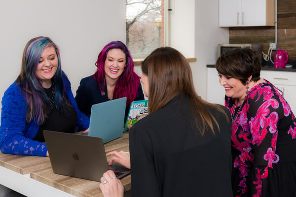 Businesswomen around a conference table