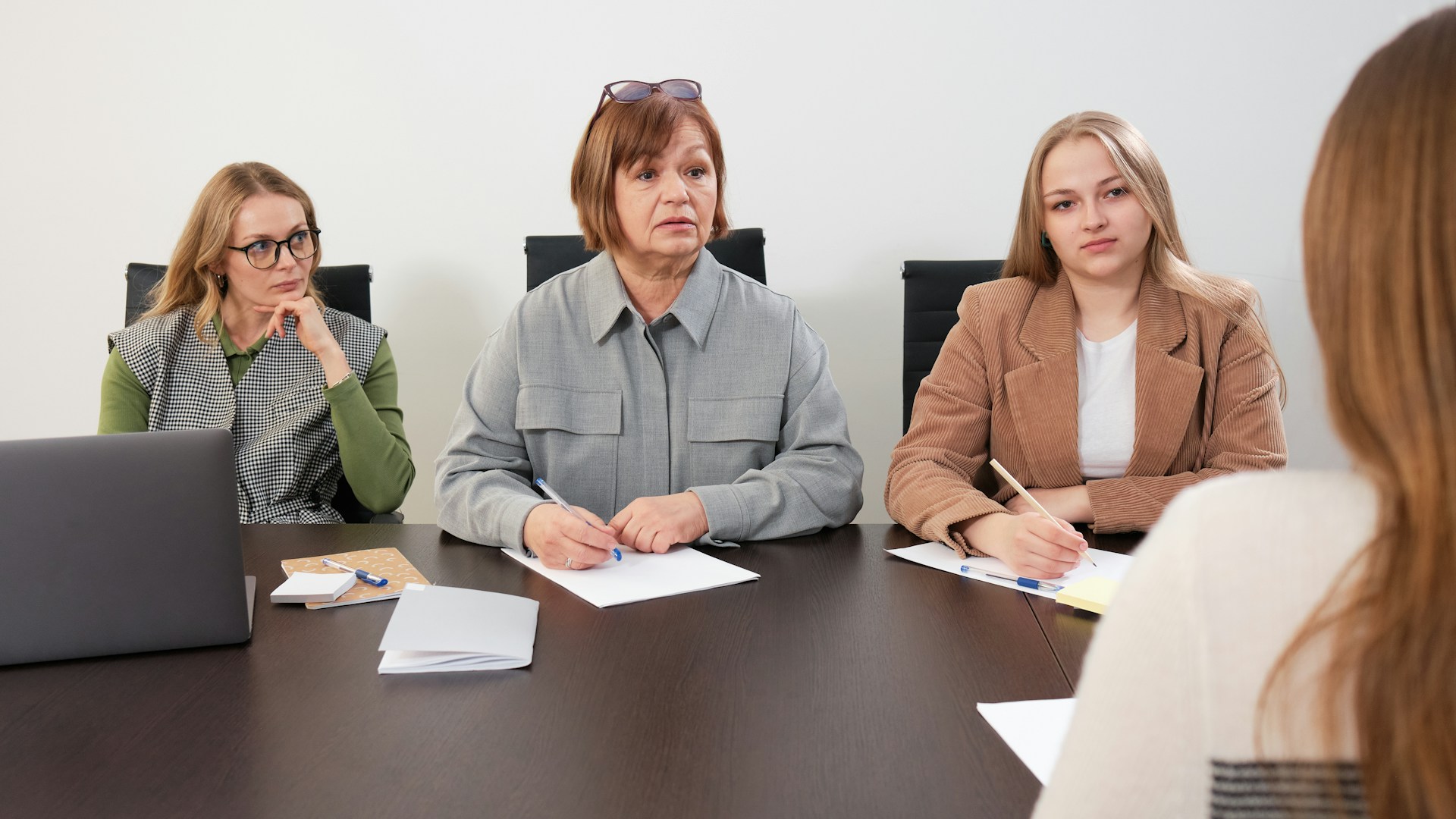 Three women interviewing